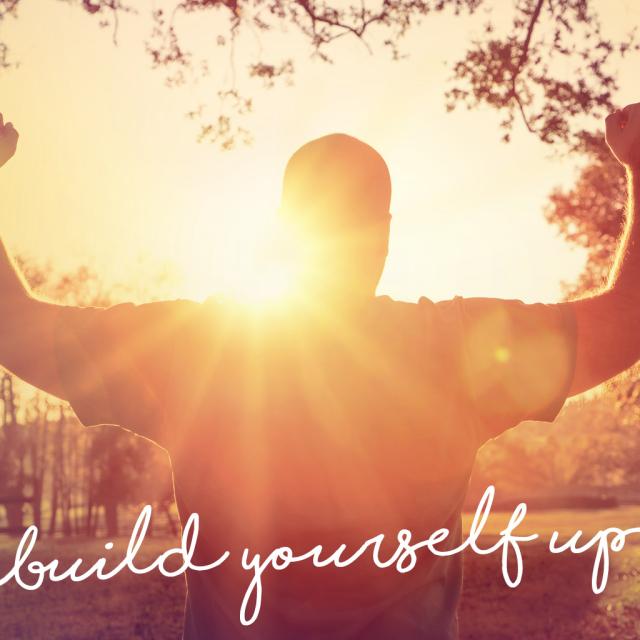 silhouette of man in front of setting sun holding arms up in triumph. Text reads: build yourself up