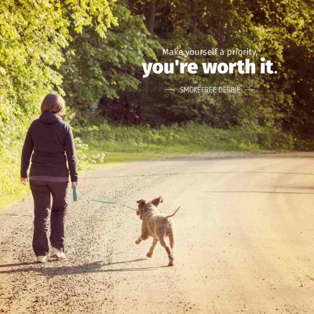 Photo of a middle aged woman walking her dog with text saying "Make yourself a priority, you're worth it -Smokefree Debbie"